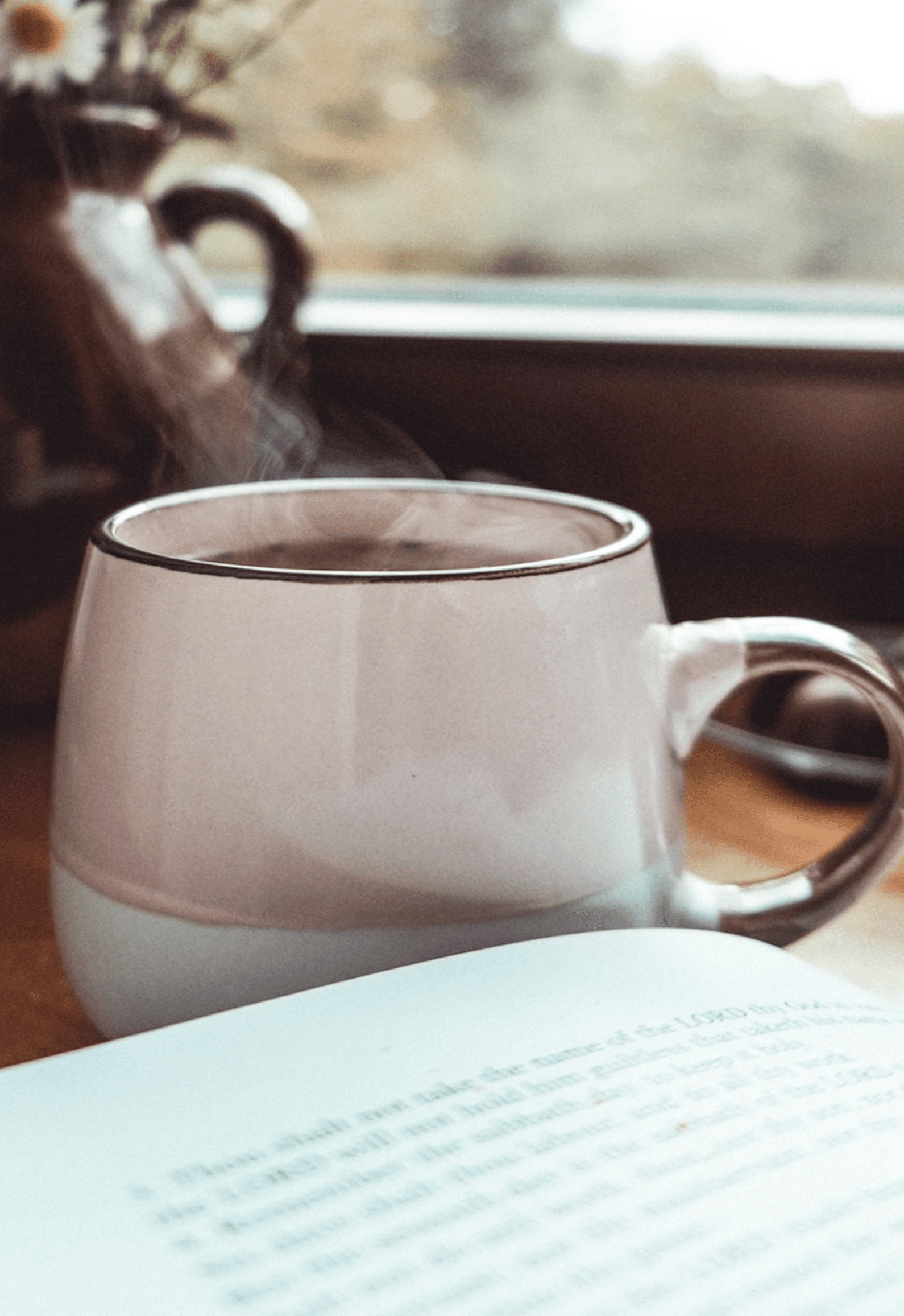 Cozy reading moment with a cup and book